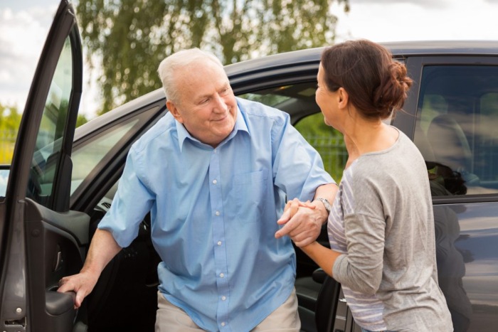 Caregiver helping a senior with mobility